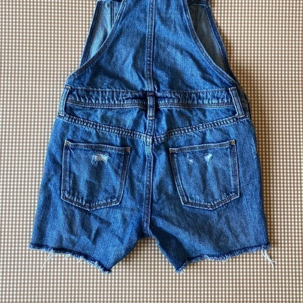 Old Navy Distressed denim shortalls. Size XL‎ Girl